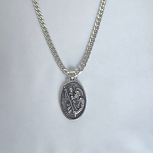Load image into Gallery viewer, High grade Stainless Steel St. Christopher pendant on a Cuban link chain. (SSSETPC002 )

